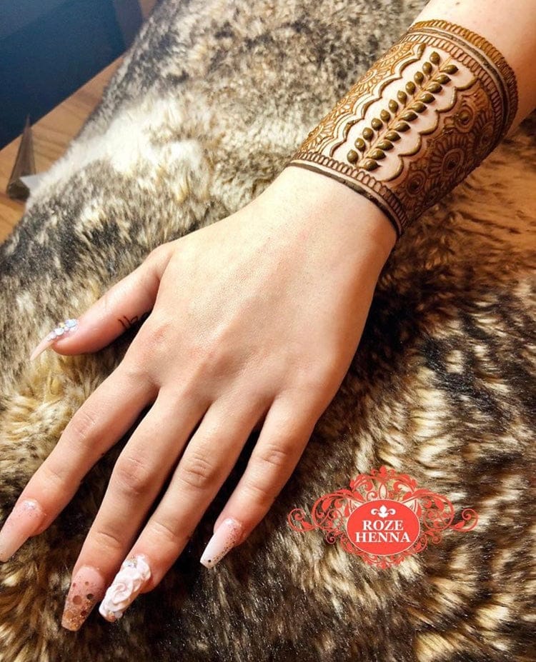 Henna skin preparation on clean, dry hands before applying henna