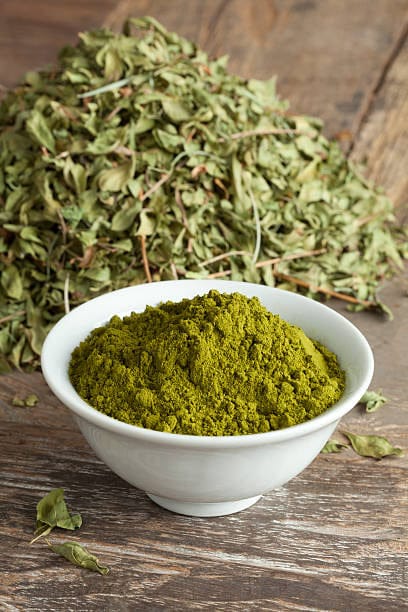 Rajasthani henna powder in a bowl - natural henna for hair and body art